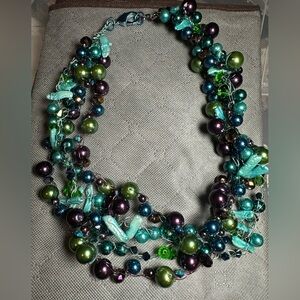 Beautiful wire and bead necklace. Purple, blue, green.
